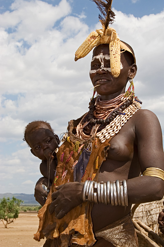 156   Karo woman with child